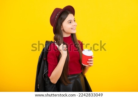 Fashion school girl holding coffee cup, learning and education. Coffee break and school recess. Back to school. Teenager student plastic takeaway cup drink cocoa or tea beverage.