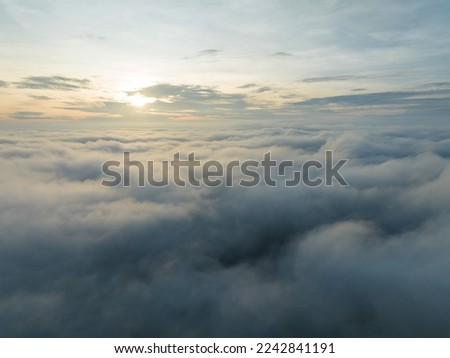 Aerial view Sea of fog Amazing video landscape drone view over sea fog texture background clouds texture Royalty-Free Stock Photo #2242841191