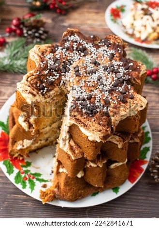 Traditional Christmas Italian cake Pandoro with Tiramisu mascarpone cream