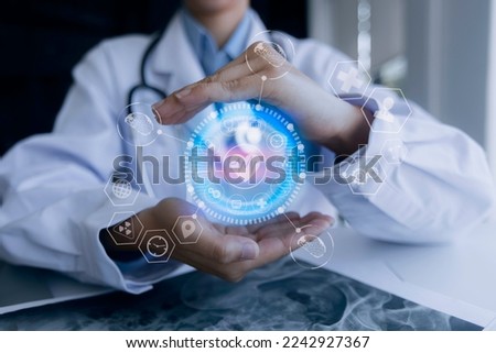 Medicine doctor hands holding digital healthcare and connection with modern virtual screen interface icons, Medical technology and network concept.  