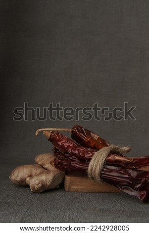 Ginger, Garlic and red chill on the grey background  