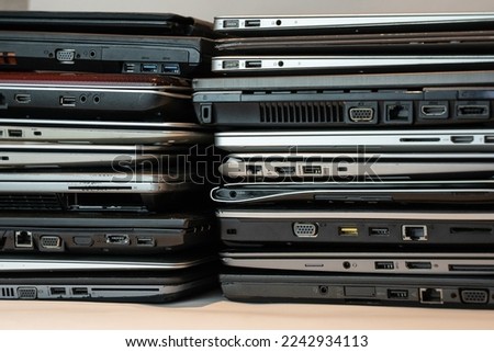 2 Stacks of old laptops	 Royalty-Free Stock Photo #2242934113