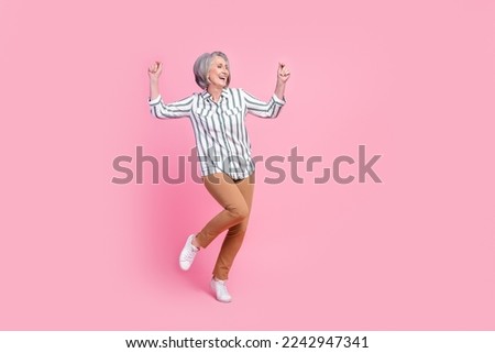 Full length photo of sweet pretty lady wear smart casual clothes having fun dancing empty space isolated pink color background
