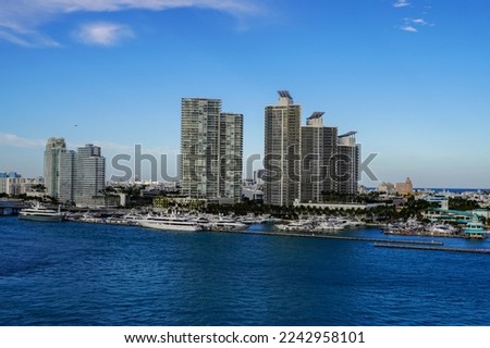 Beautiful aerial panoramic view of the city of Miami, its buildings, marina, yachts and luxurious suburbs houses