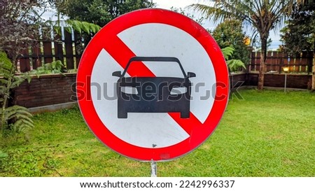 No-parking signs: Signs with the car picture' in a red circle marked with a diagonal line, including no-parking signs for road users that they are prohibited from parking their vehicles.