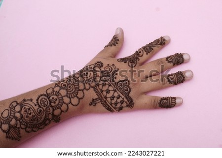  mehendi design tattoo on girl. Indian Mehendi celebration. Henna application and rituals. Indian bride and bridesmaid showing henna art