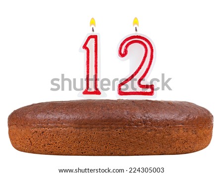 birthday cake with candles number 12 isolated on white background