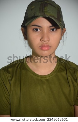 A Serious Female Soldier Portrait Royalty-Free Stock Photo #2243068631