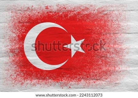 Flag of Turkey. Flag painted on a white plastered brick wall. Brick background. Copy space. Textured creative background
