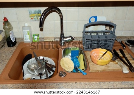 Symbol picture household: Sink with dirty dishes