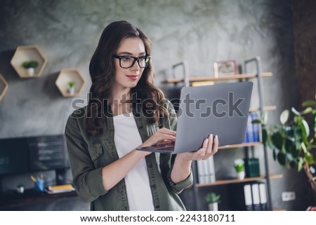 Photo of busy happy lady freelancer wear glasses chatting instagram twitter telegram indoors workstation workshop