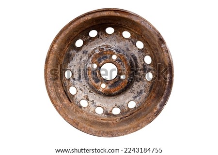 old rusty metal car rim isolated on white background. side view. High quality photo