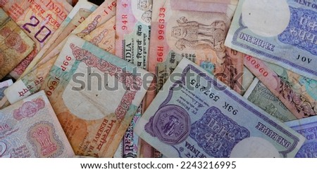 Vintage Old Indian Currency, A background of old vintage Indian currency notes. Royalty-Free Stock Photo #2243216995