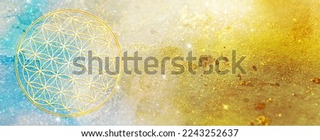 Abstract glittering background in gold and turquoise with golden flower of life symbol Royalty-Free Stock Photo #2243252637