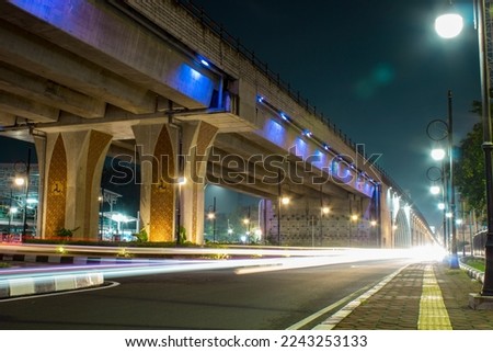 View of night traffic on Purwosari flyover with light lamps and light trails. Located on Purwosari, Surakarta  Royalty-Free Stock Photo #2243253133