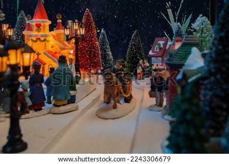 Christmas village porcelain decoration at night