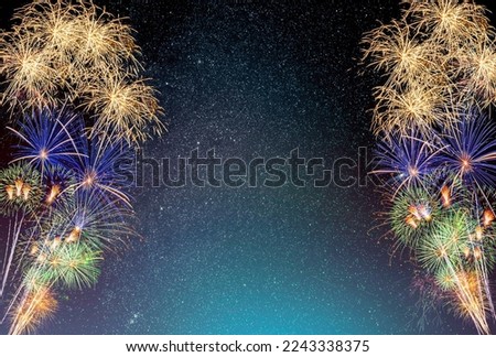 Fireworks display on milkyway sky background.