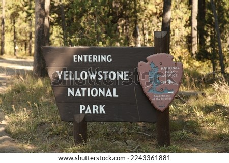Yellowstone National Park entrance sign along road to Bechler Ranger Station, Wyoming