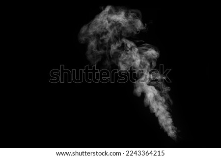 White curling dense smoke steam rising up is isolated on black background to overlay your photos. Steam background