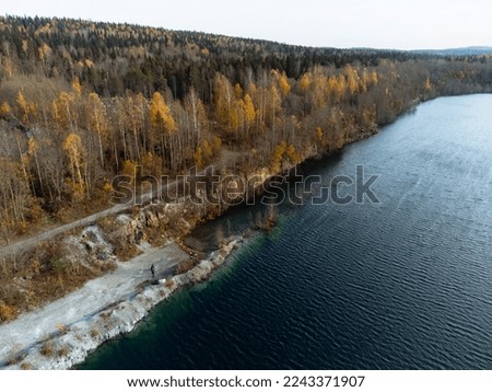 The autumn forest and lakes from above. The Ruskeala Park view from the drone.