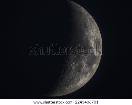 The Earth's sole natural satellite and nearest large celestial body Royalty-Free Stock Photo #2243406701