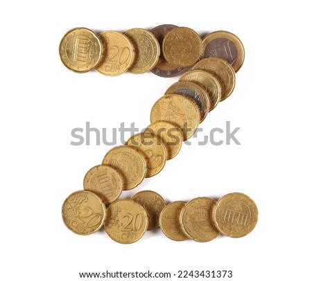 Euro metal coins in shape letter Z isolated on white, top view
