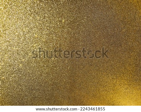 Sparkly shiny wrapping paper with gold glitter background for Christmas holiday wallpaper seasonal decoration, wallpaper design element.