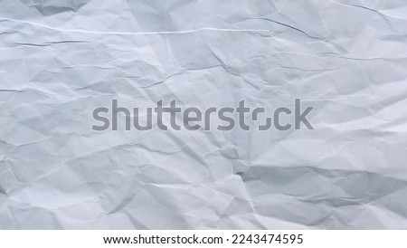 free photo crumpled paper texture background
