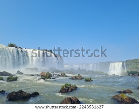 iguazu falls with lots of water. Seven Wonders of the World. Royalty-Free Stock Photo #2243531627