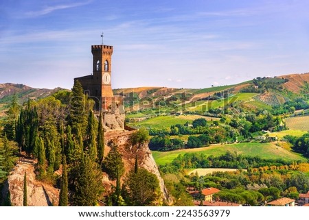 Brisighella historic clock tower on the cliff. This 1800s architecture is known as the Torre dell'Orologio. Ravenna province, .Emilia Romagna region, Italy, Europe. Royalty-Free Stock Photo #2243563979