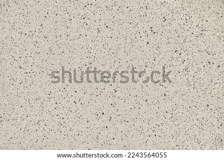 Beige and black stone surface texture background. High resolution photography