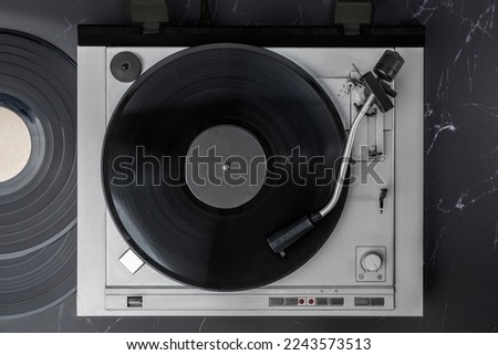 Turntable Vinyl records, party music, top view. Empty copy space for record label mockup. Vintage retro sound recording style. Background for the design of a poster, postcard, flyer for music events.