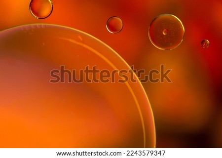 Abstract colourful bubbles. Soft background with orange sunrise color circles.