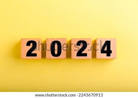 Wood block with new year concept on it.