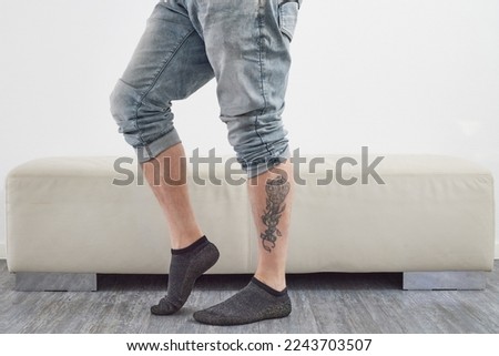 Man with barefoot shoes standing on floor