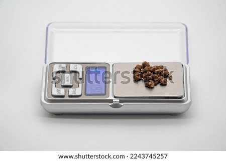 Will Psilocybin truffles and magic mushrooms be the future for treating depression and anxiety. Picture of Psilocybin truffles on a pocket scale for micro dosing.