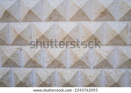 Marble pyramid or Triangle stone that High relief to decoration on  wall backgrounds and textures.