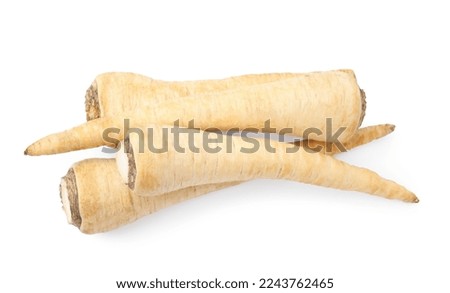 Raw parsley roots isolated on white, top view Royalty-Free Stock Photo #2243762465
