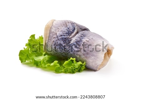 Salted herring rollmops, isolated on white background. High resolution image