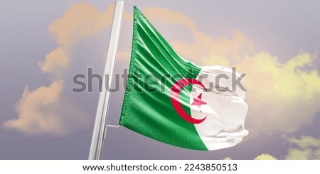 Waving Flag of Algeria in the Sky. The symbol of the state on wavy cotton fabric.