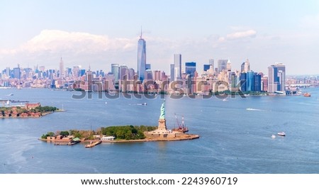 Statue of Liberty and Lower Manhattan skyline, aerial view.