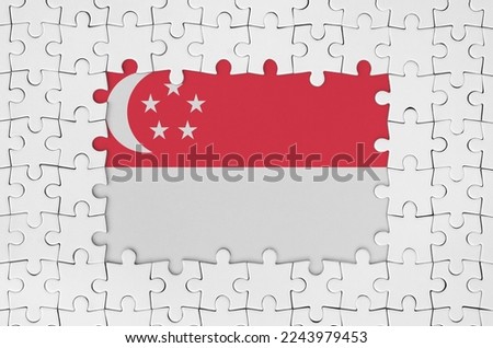 Singapore flag in frame of white puzzle pieces with missing central parts