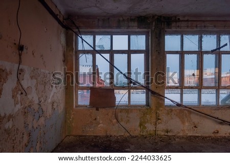 Old abandoned haunted red brick factory of stockings, pantyhose and socks in Central Europe, Poland Royalty-Free Stock Photo #2244033625