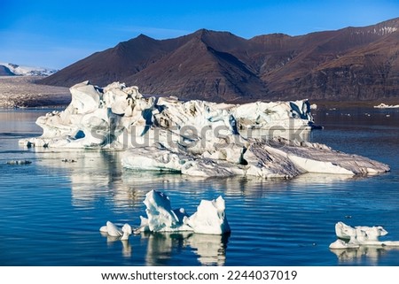 Glacial river lagoon Jökulsárlón with floating ice floes, Iceland Royalty-Free Stock Photo #2244037019