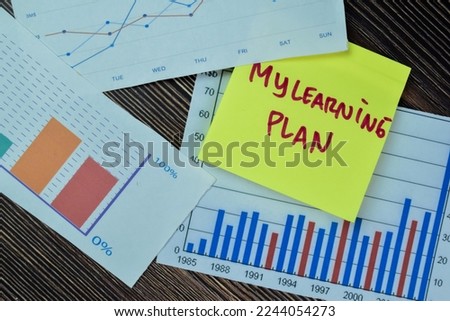 Concept of My Learning Plan write on sticky notes isolated on Wooden Table.