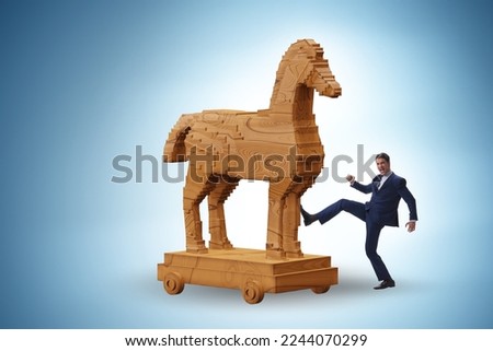 Businessman and trojan horse in trap concept
