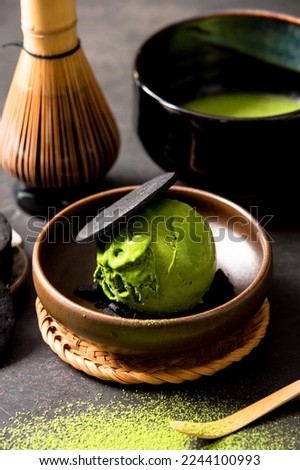 Green tea ice cream is a type of ice cream that is flavored with green tea. It is typically made with a base of milk and cream, as well as sugar and green tea leaves or green tea extract.