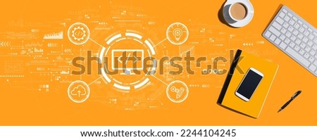 Web development concept with a computer keyboard and office items