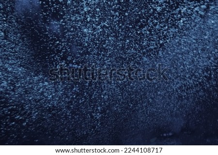 bubbles under water diving background Royalty-Free Stock Photo #2244108717