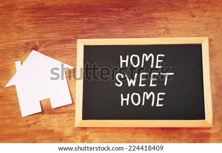 top view of blackboard with the phrase home sweet home
